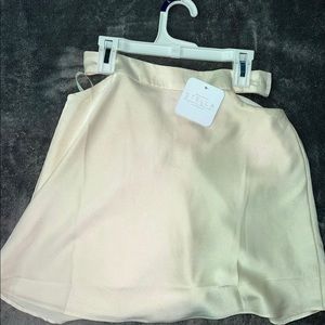 Cream colored mini skirt